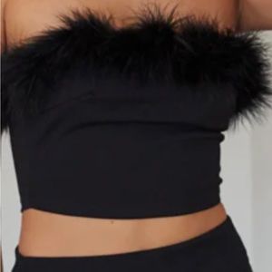 Feather edge black top.  Size M